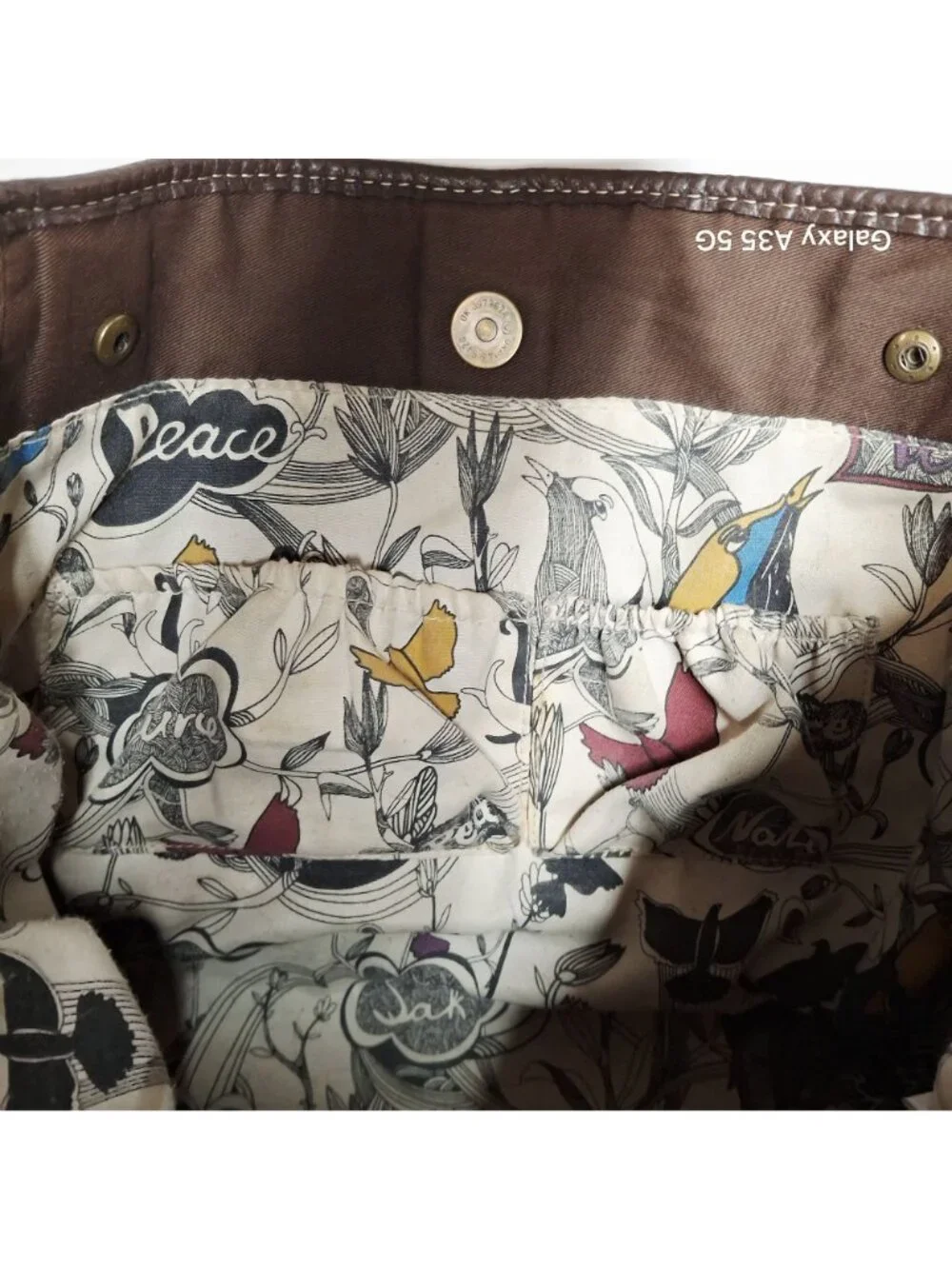 The Sak Brown Pebbled Leather Shoulder Bag With Printed Fabric Lining & Brass Ha